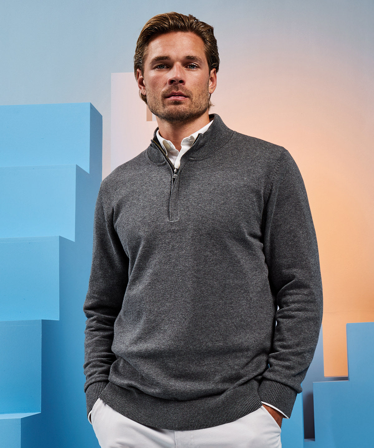 Men's cotton blend ¼ zip sweater available in multiple sizes and colors