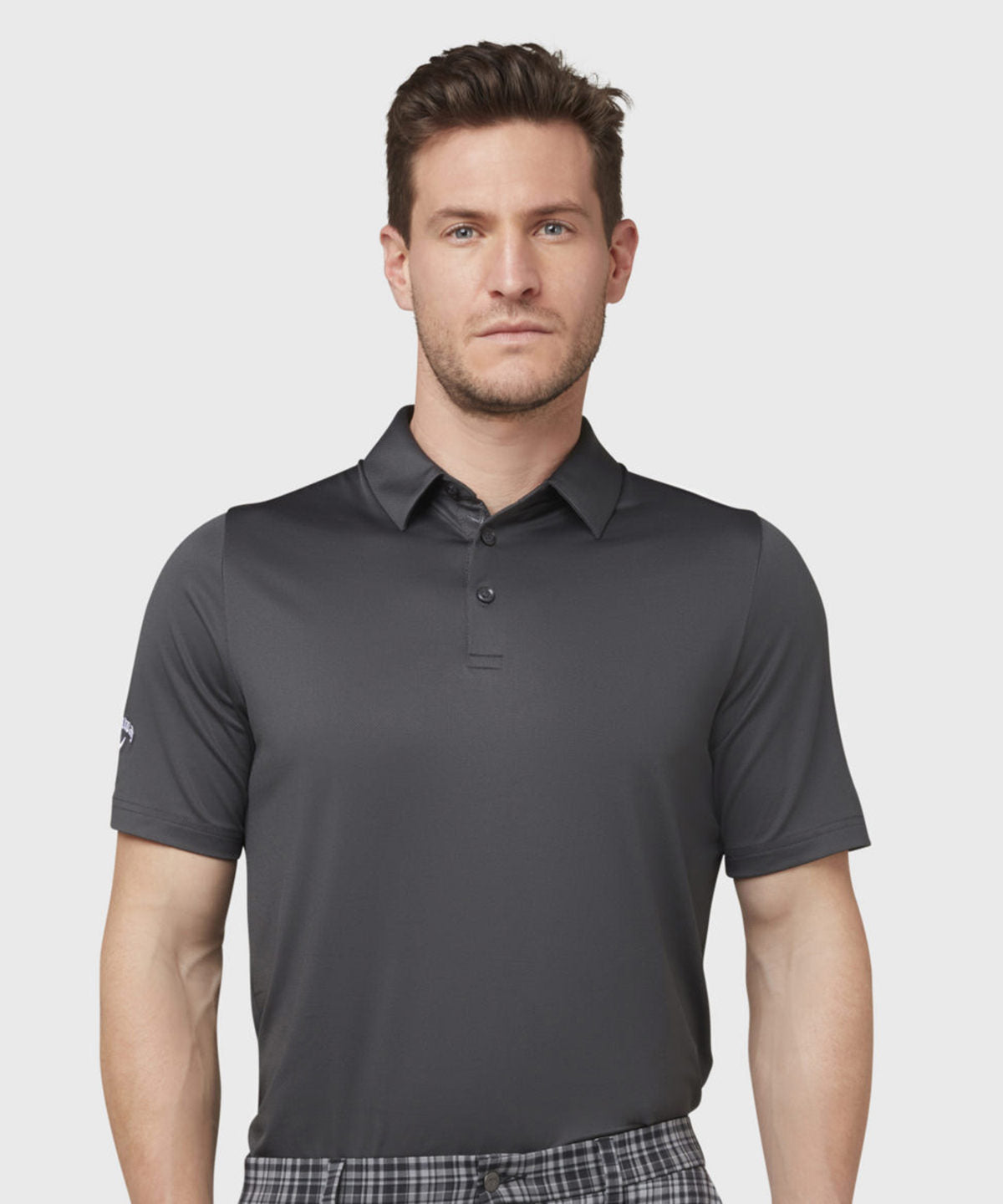 Swing Tech™ solid polo shirt with moisture-wicking performance and classic fit for active wear
