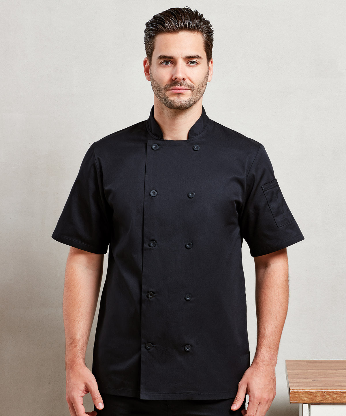 Short sleeve chef’s jacket available in multiple sizes and colors