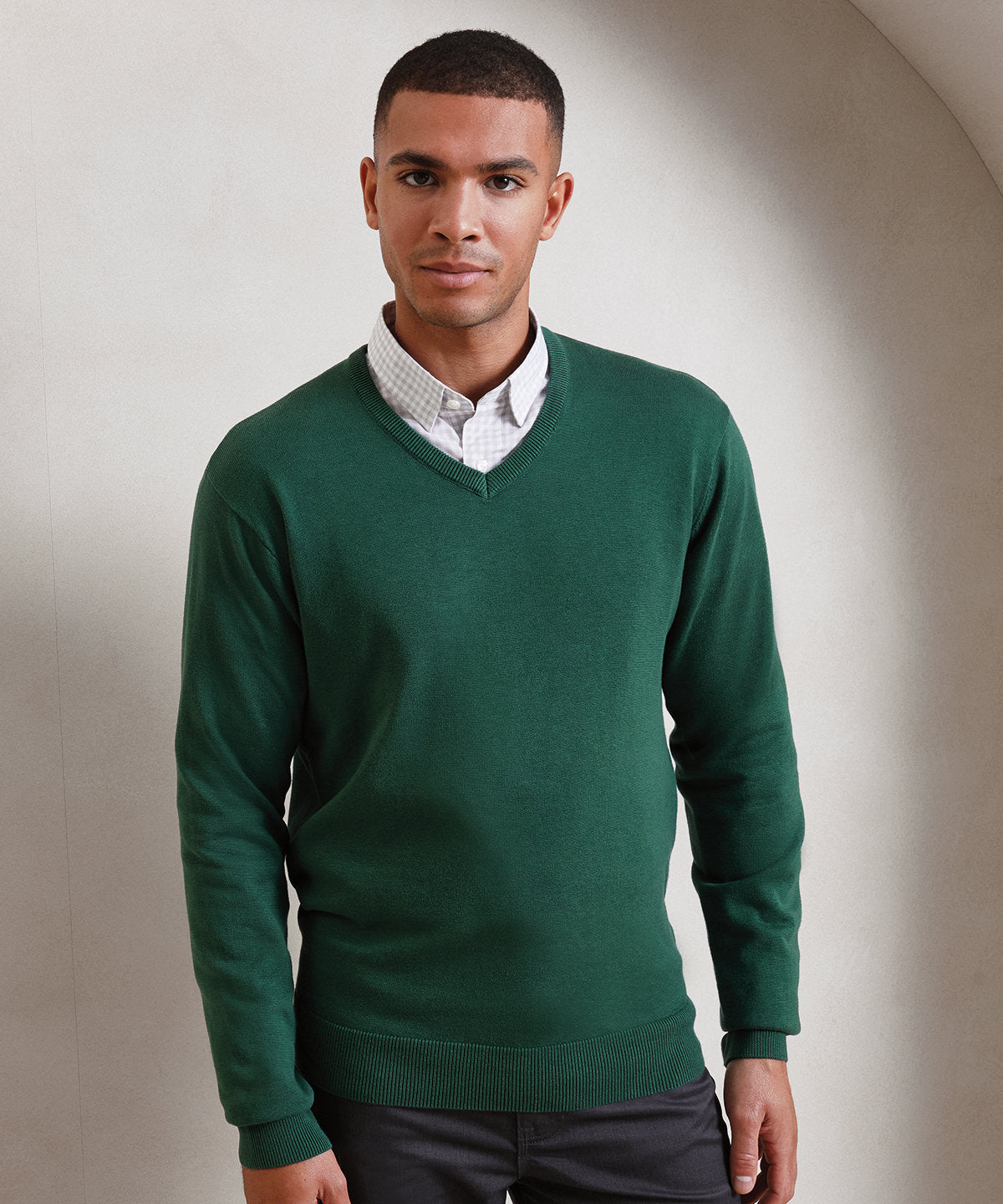 V-neck knitted sweater available in multiple sizes and colors